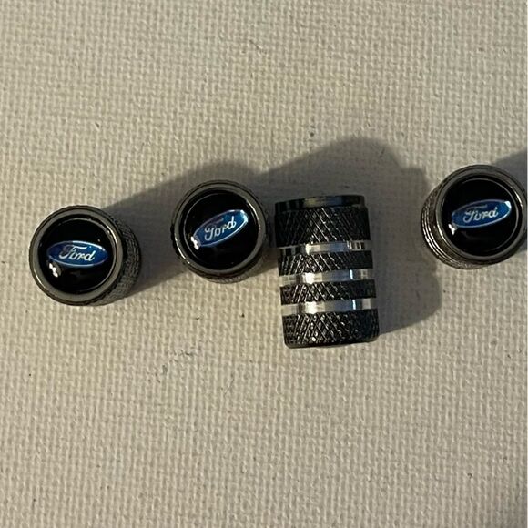Ford valve Stem caps in Gray set of 4 NWT - Picture 1 of 4
